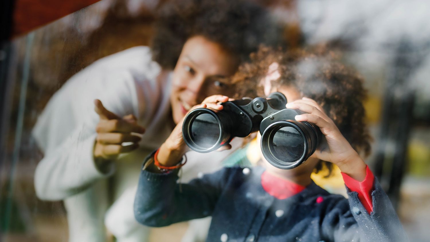 CENTOGENE Little Child Looking out of Window With Binoculars